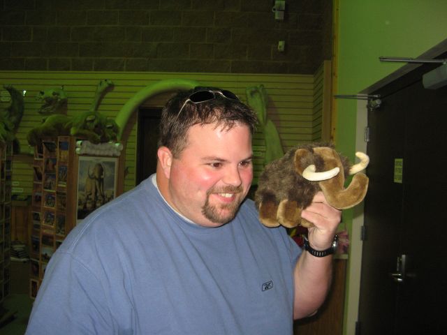 Gus with wooly mammoth doll